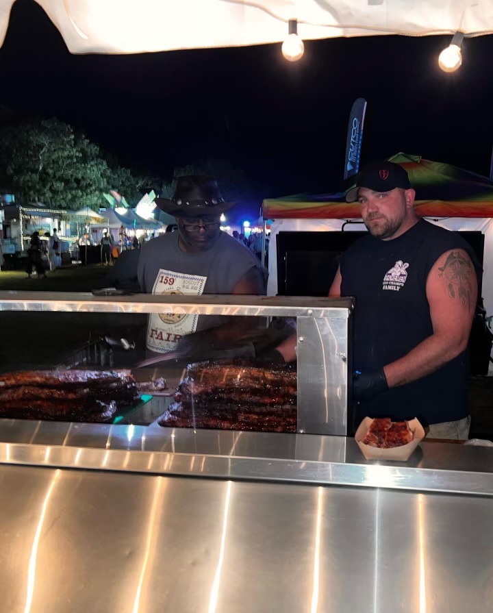 Island Que Smokers cooking at an outdoor event